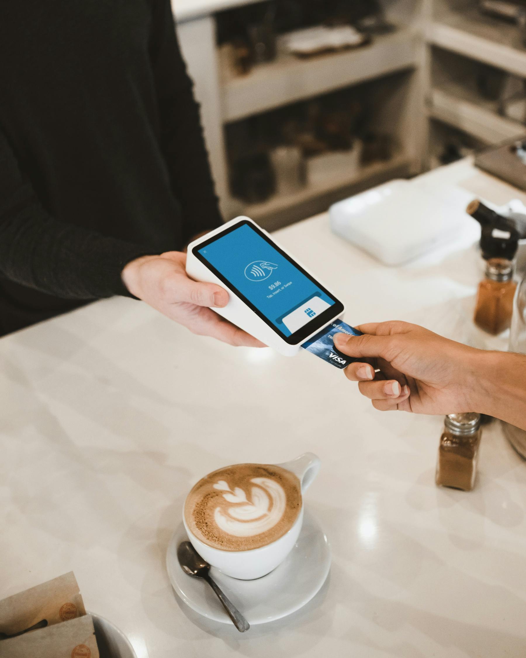 debit credit card to pay at coffee shop