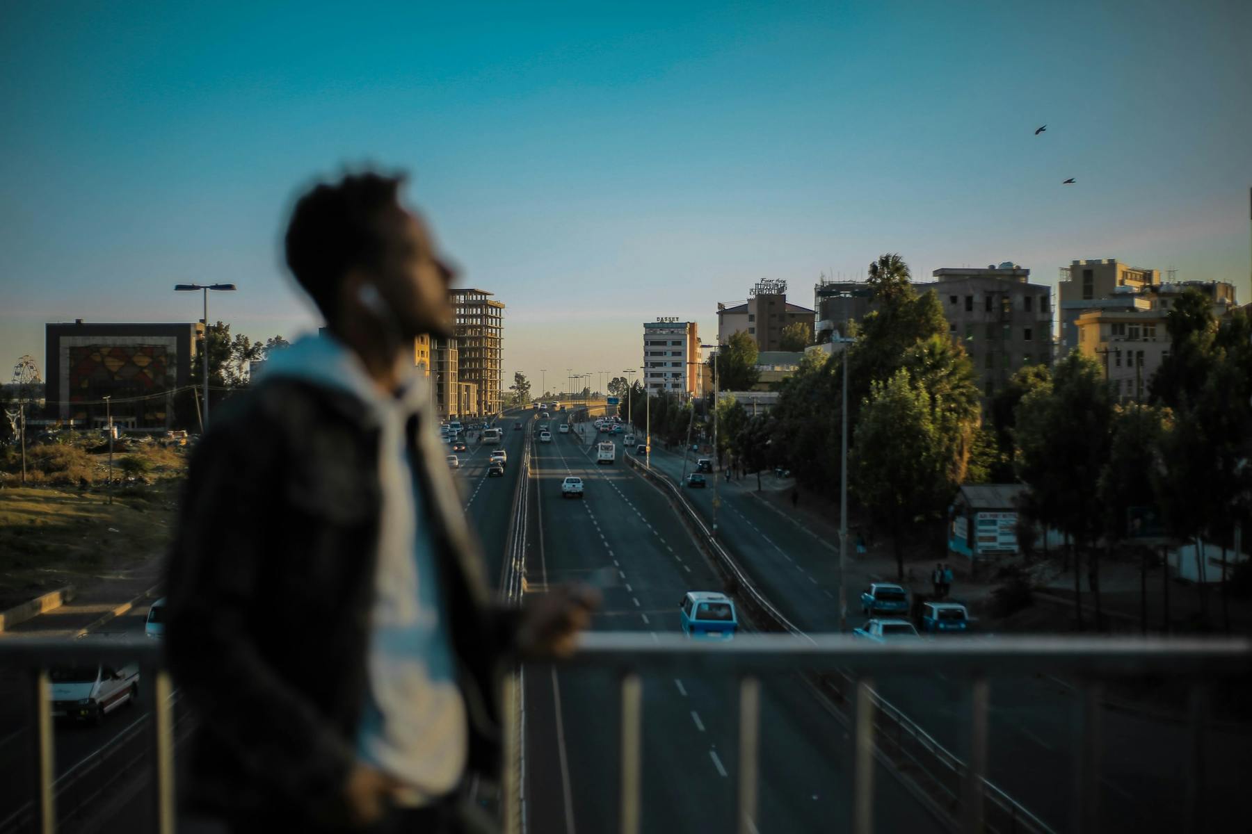 Man walking over bridge in Addis Ababa, Ethiopia,